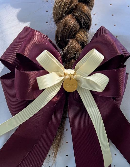 Burgundy and ivory horse show bow for jumper riders