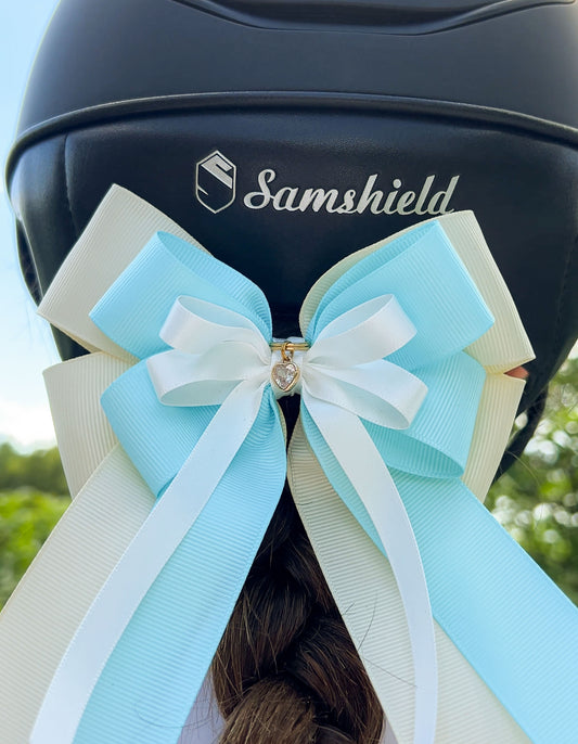 Turquoise horse show bow for jumper riders