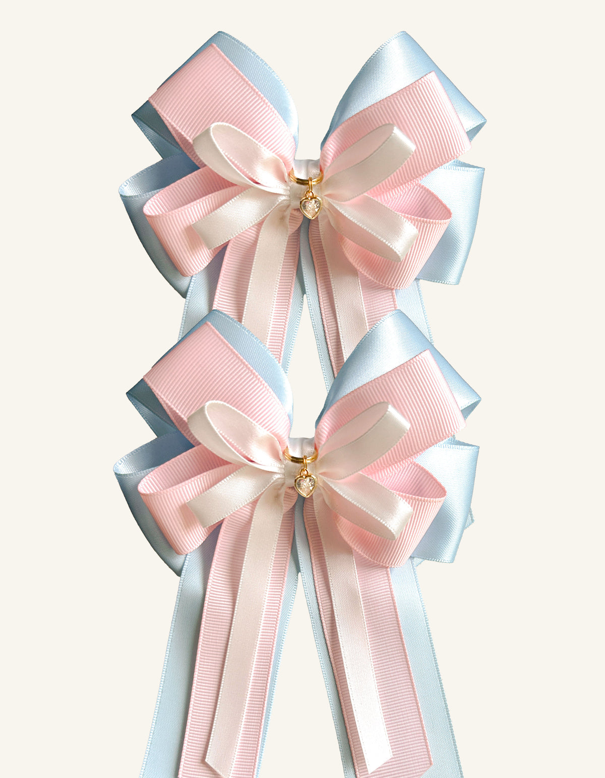 Baby blue and blush pink equestrian show bows for young riders