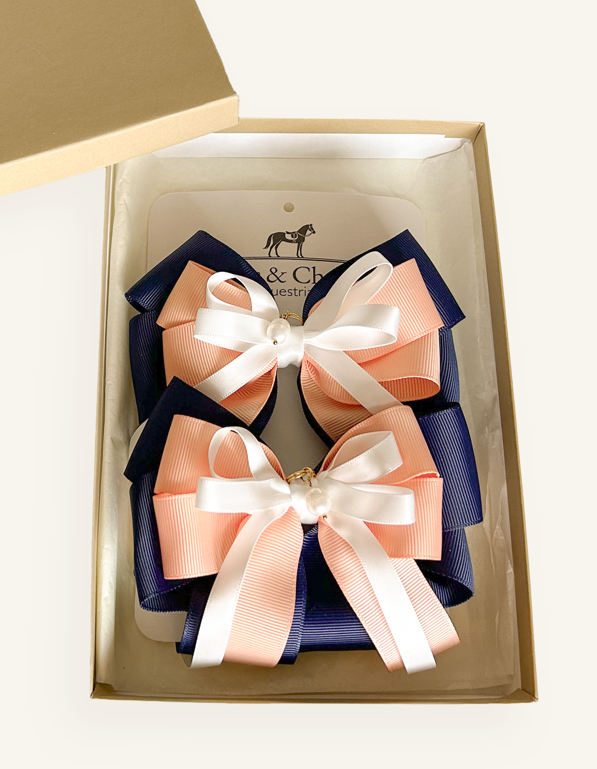 Handcrafted navy equestrian show bows for horse shows