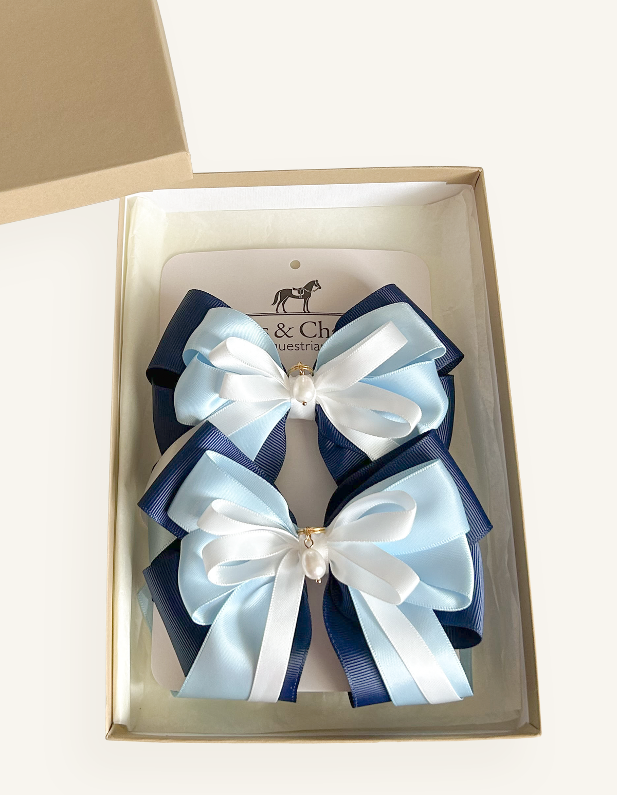 Ocean Whisper blue and navy horse show bows in Bows & Charms gift box