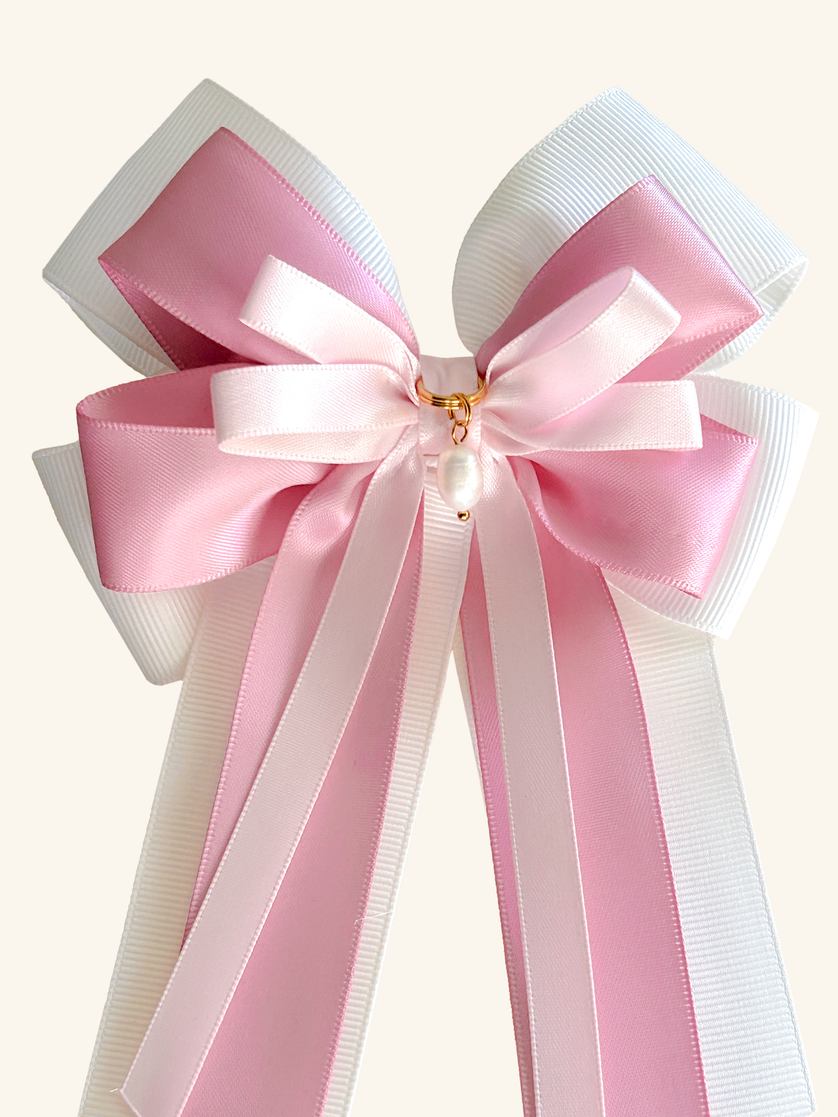 Pink Pearl horse show bow with white grosgrain, pink satin and a pearl charm