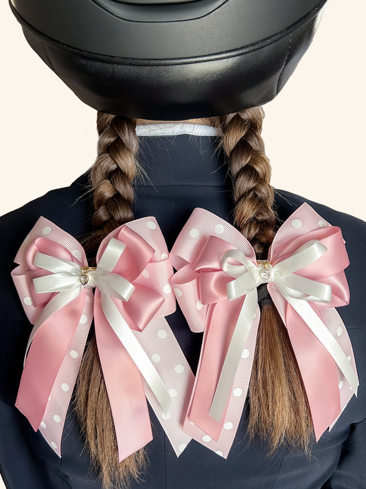 Pink polka dot horse show bows with gold French barrettes