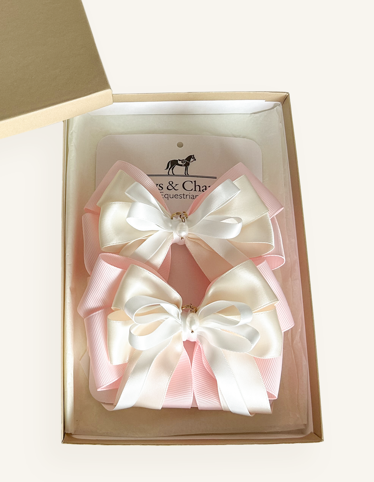 Handcrafted pink equestrian show bows for horse shows